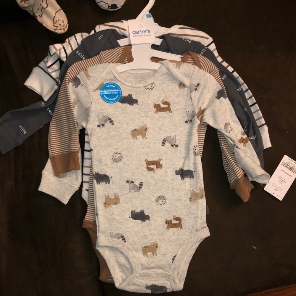 Brand new Carter’s onesies